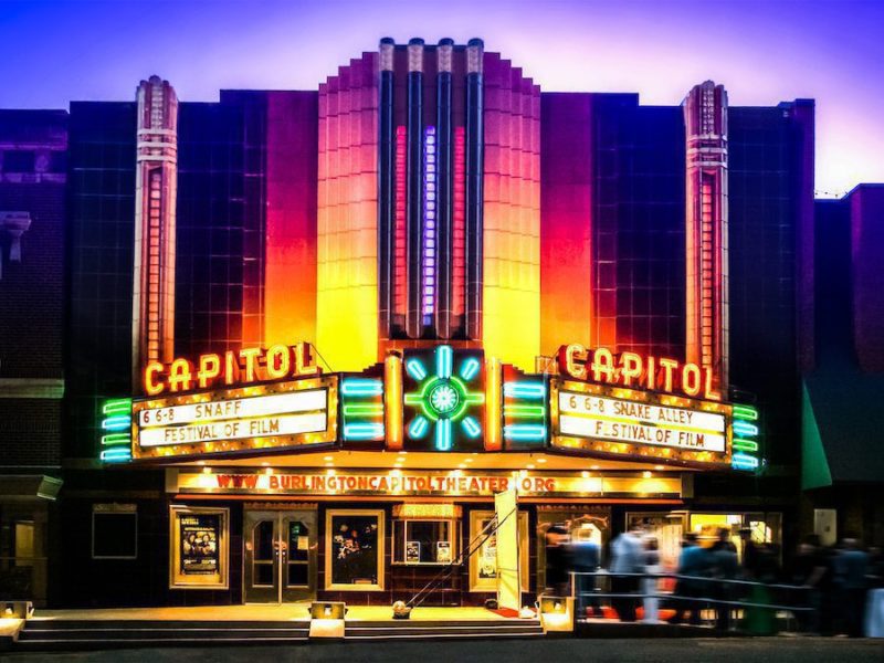 Capitol Theater exterior with lights on in the evening