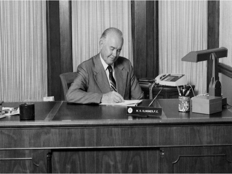 William H. Klingner sitting at desk