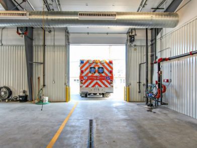 Ambulance leaving garage