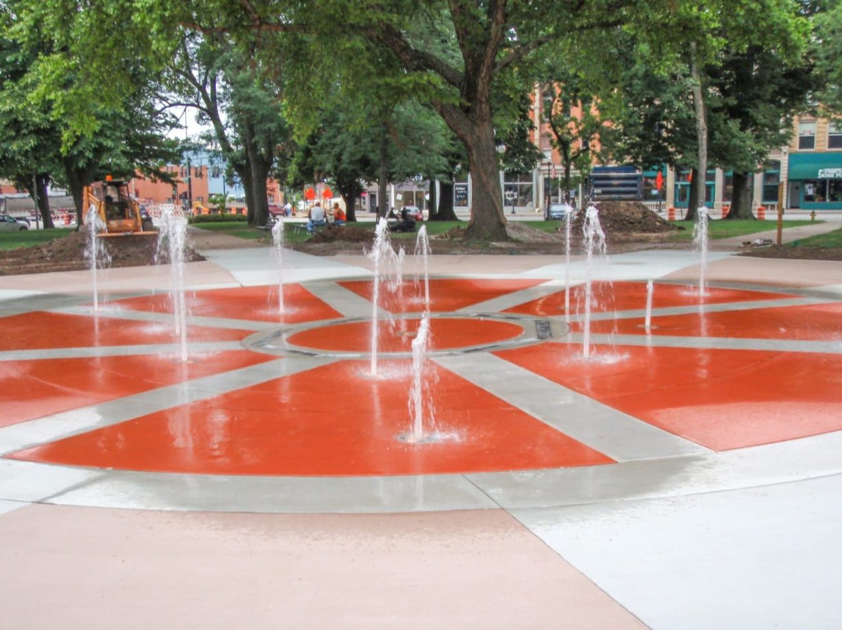 Sprayground water feature in the center of Washington Park