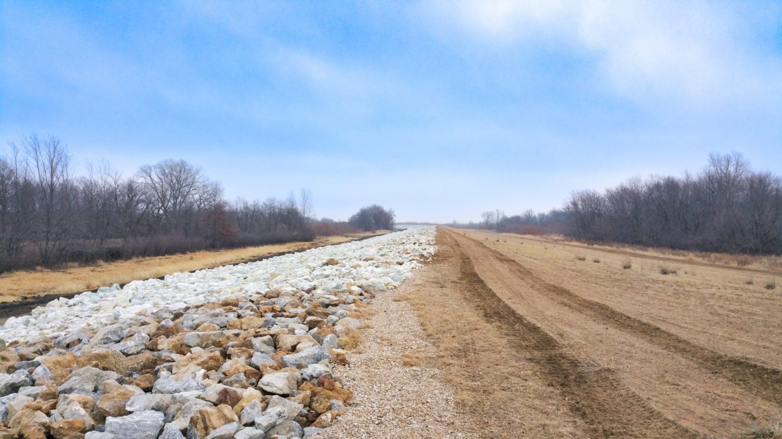 Repaired section of a levee with new rip rap