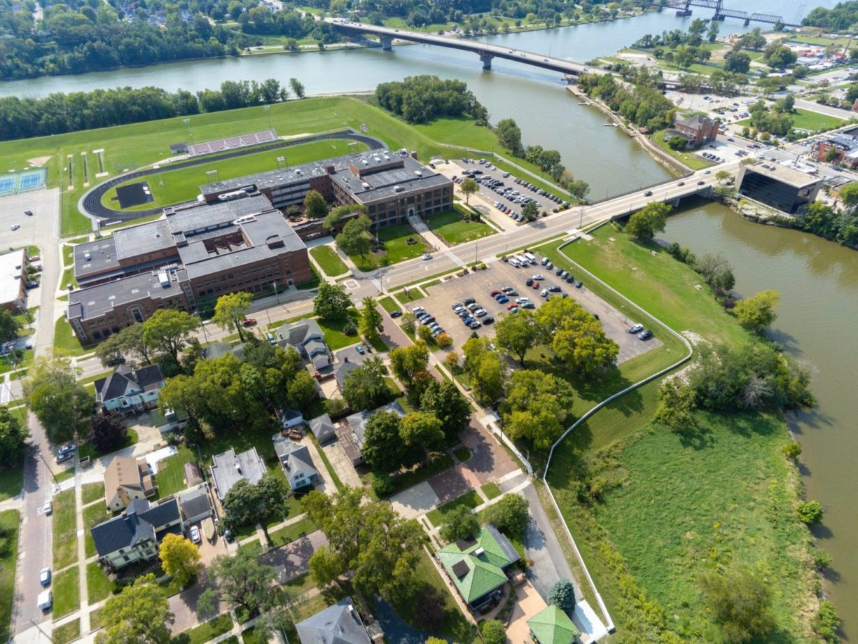 Aerial view of the floodwall surrounding the high school and adjacent neighborhood