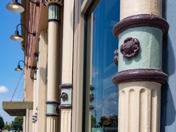 Closeup on painted iron storefront columns