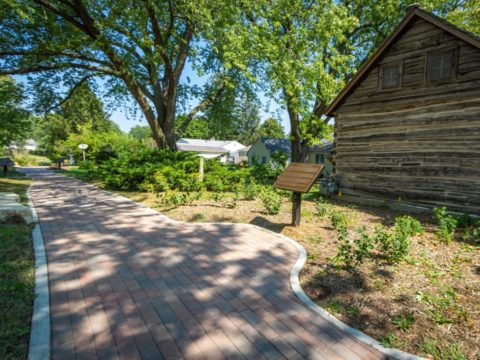 Informational plaque on the Tuttle Cabin Learning Walkway