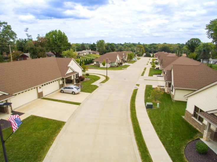 Assisted living cottages lining a private roadway