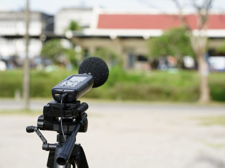 Measuring The Noise On The Road With A Sound Level Meter.