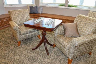 Chess board and armchairs in the lounge