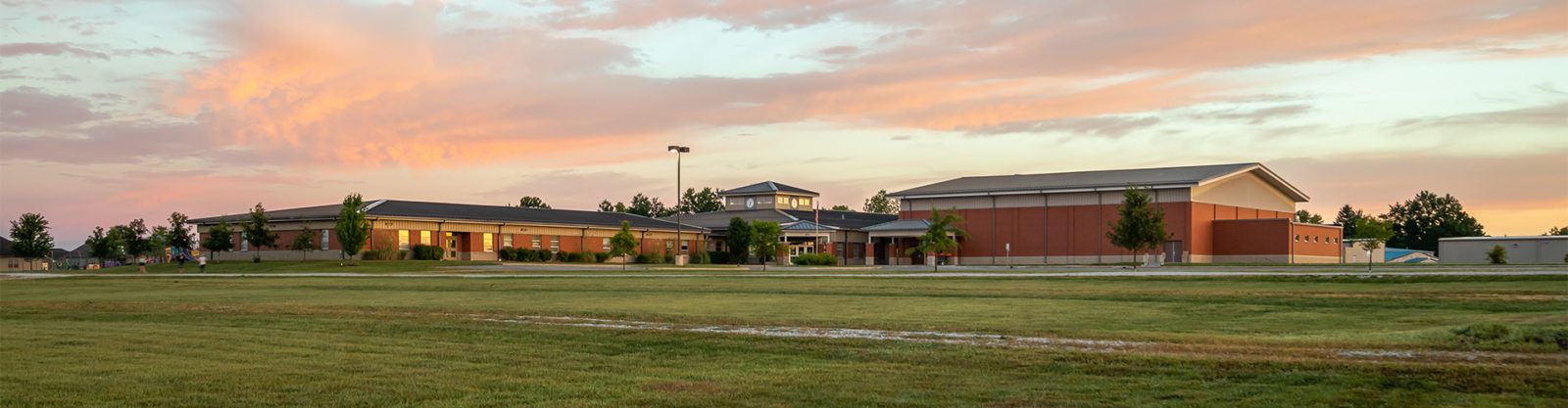 A school building at sunset