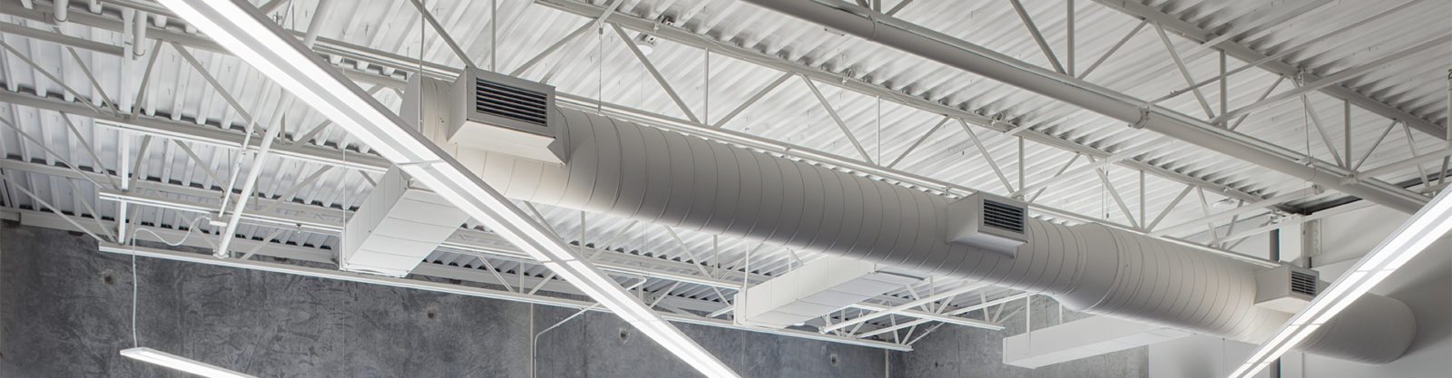 Lights and HVAC ducts suspended from a ceiling